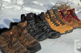 All four budget hiking boots lined up in the snow next to eaohother