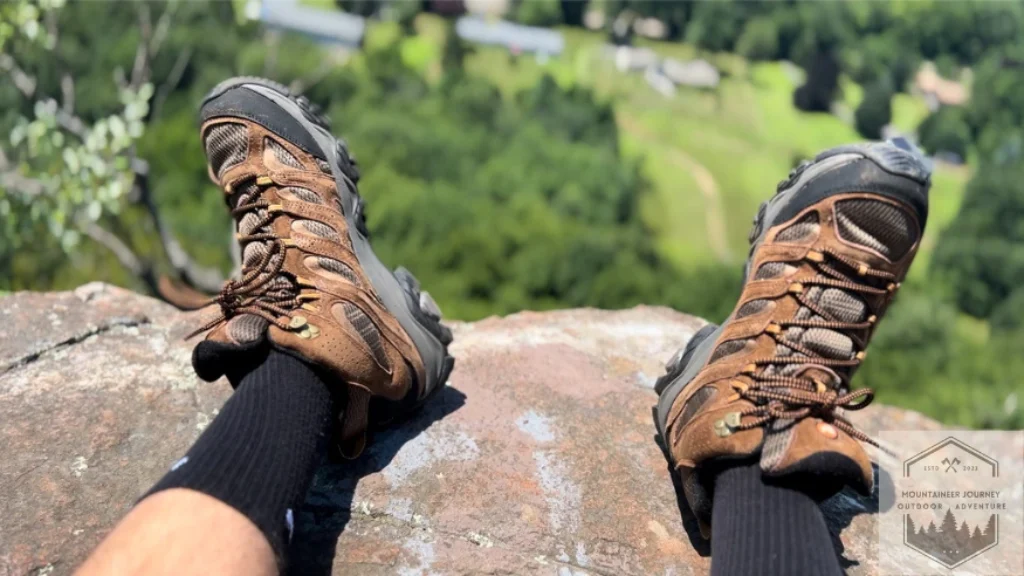 After testing, sitting on a rock showcasing the Moab 3's