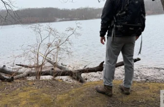 Taking in a moment after the hike to look over the lake and enjoy the present moment