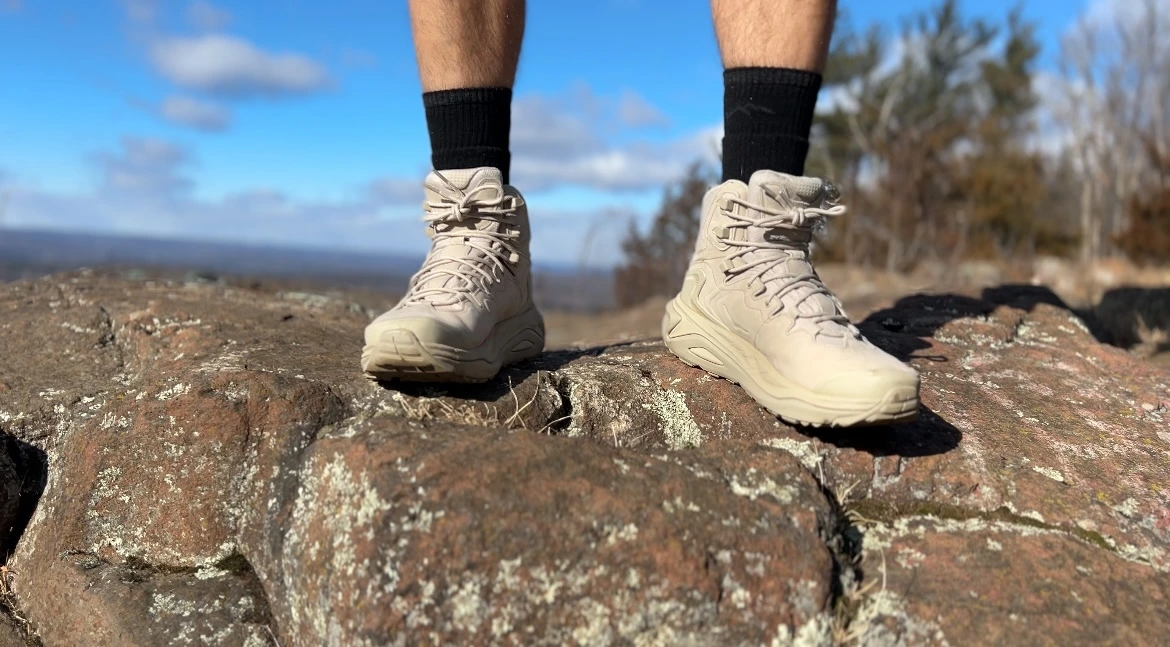 Wearing The Hoka Kaha 3's on a rock highlighting the front of the boots
