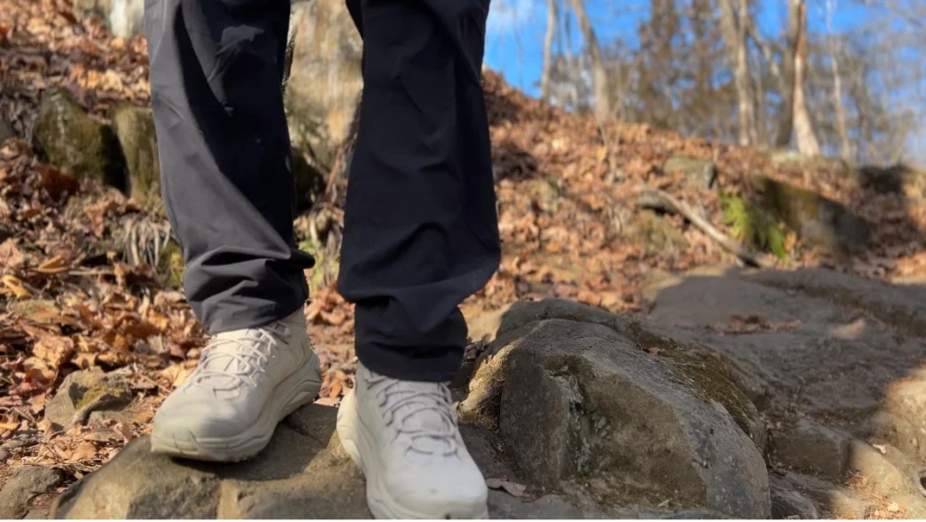 The Hoka Kaha 3 has superior stability and support while on trail. standing on uneven rocks