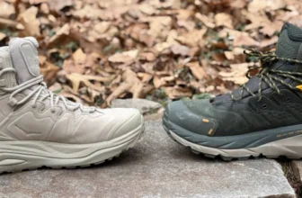 Kaha 3(Left) facing the Kaha 2(right) on a stone wall showing the side view of both boots