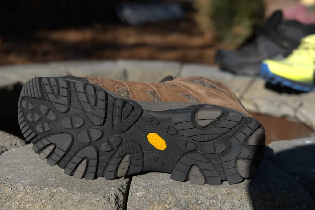 Underside view of the Merrell Moab 3 Vibram® TC5+ outsole after 150 miles of testing, showing no lug breakdown and fully intact traction patterns for technical trails.
