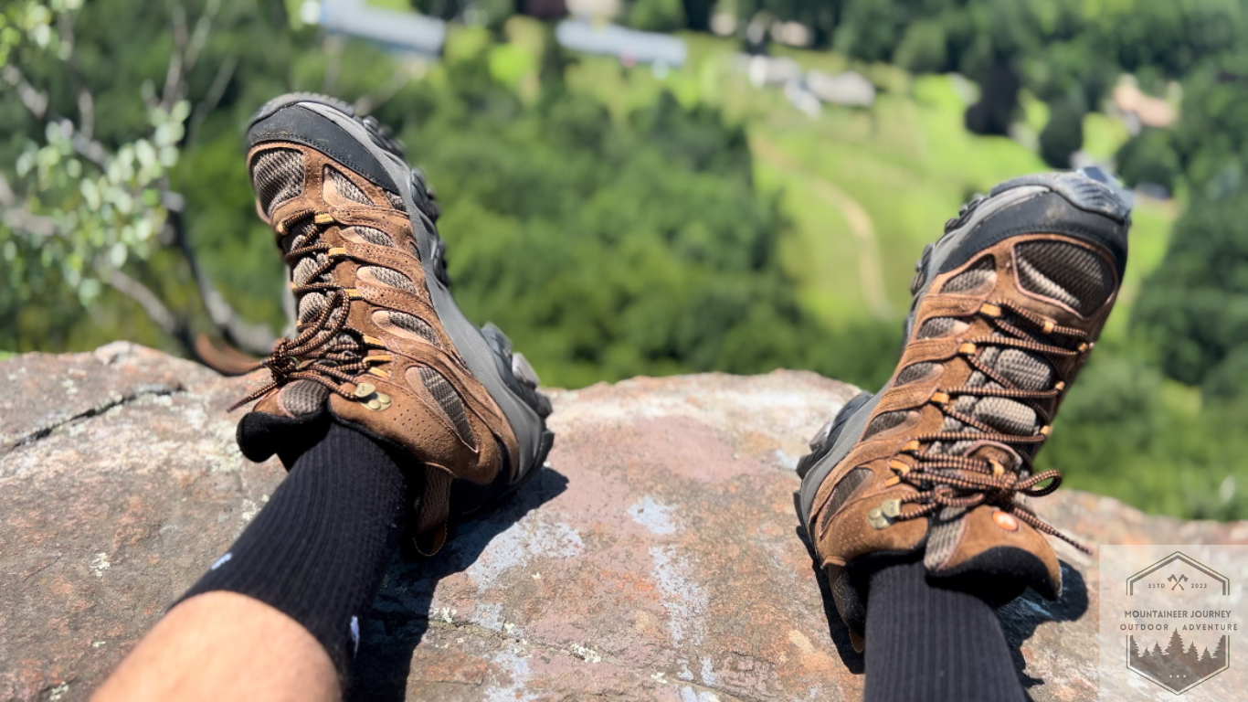 Merrell moba 3 resting on rocks at the summit