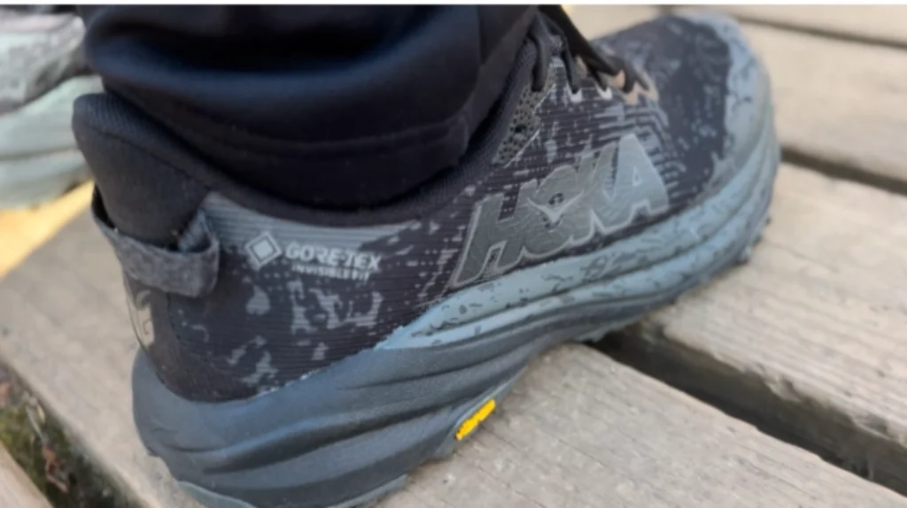 a trail runner, hoka speedgoat 6