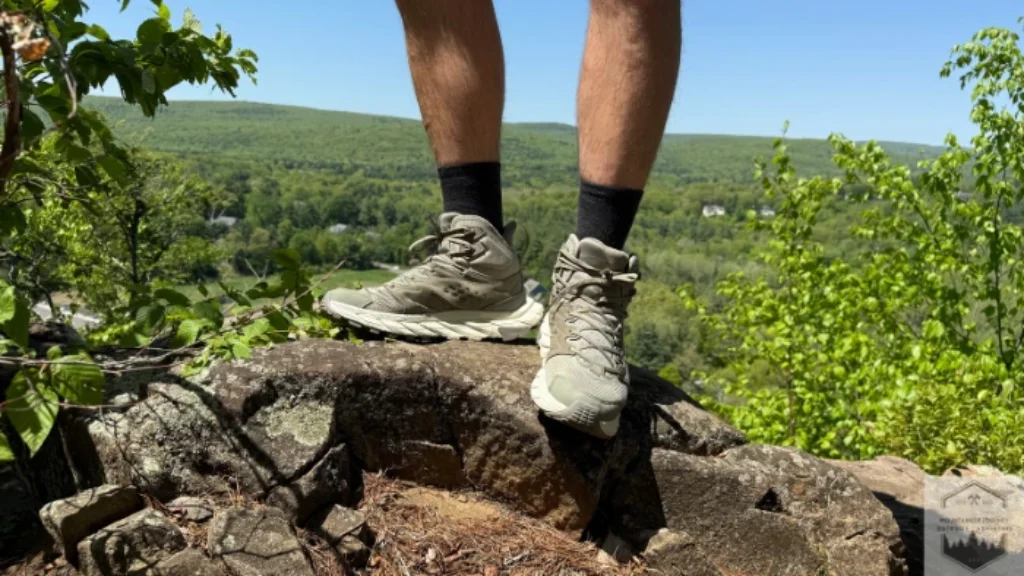 Standing on uneven terrain with the Hoka Anacapa Breeze during testing
