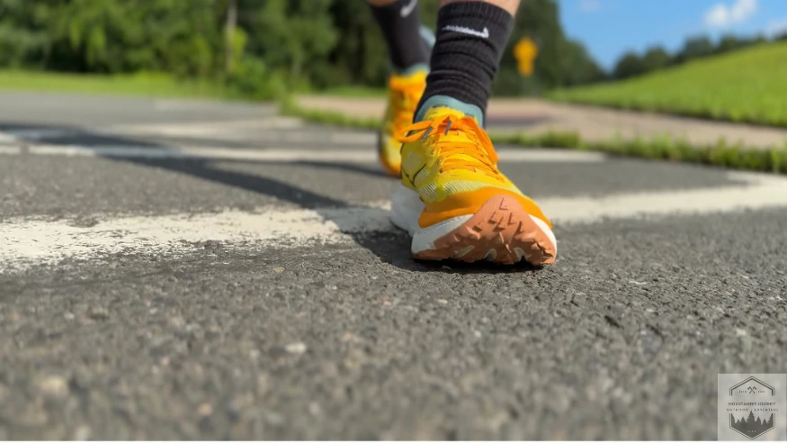 Wearing the Hoka Mafate X while testing them on flat asphalt