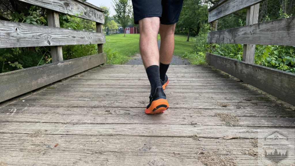 walking over a bridge during our testing of the Altra Experience Flow