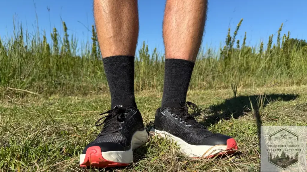 Wearing the Kjerag 2 on the trail after testing, sky in background