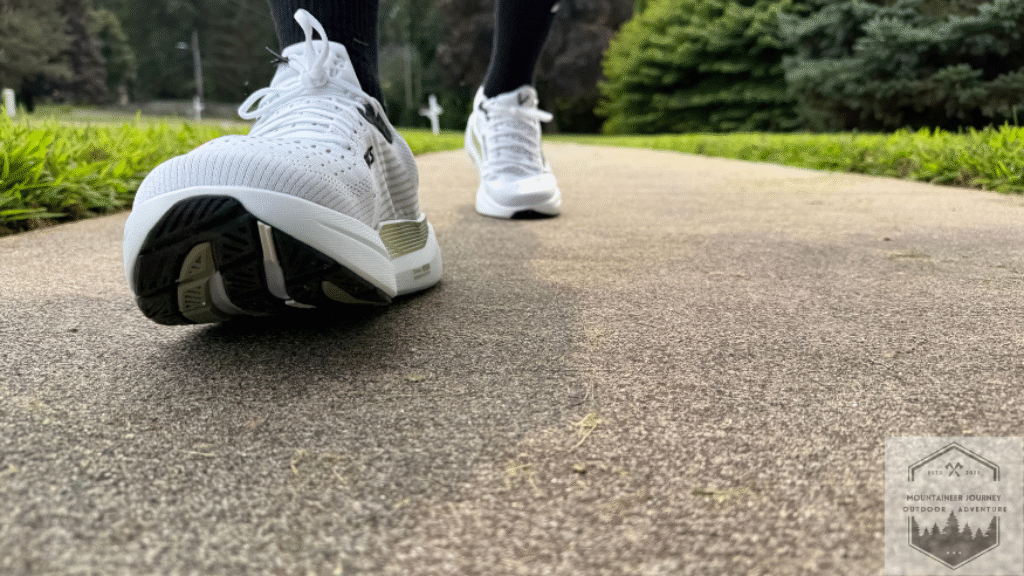walking on concrete while testing the ankle stability of the ghost max 3