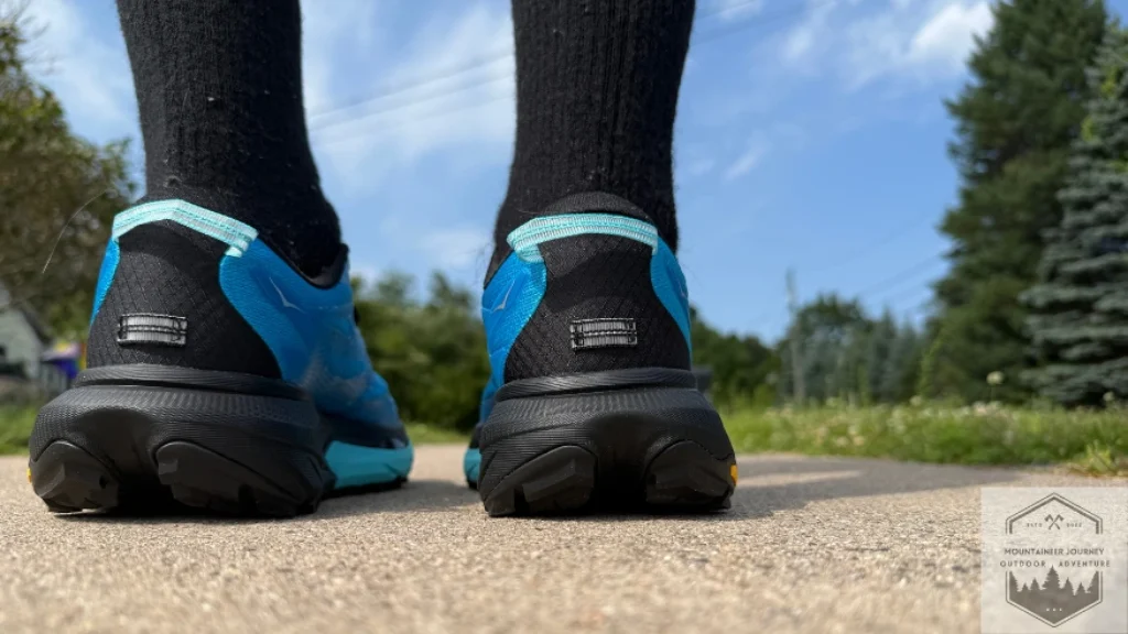 heel view of both shoes, missing a heel shank from the previous model