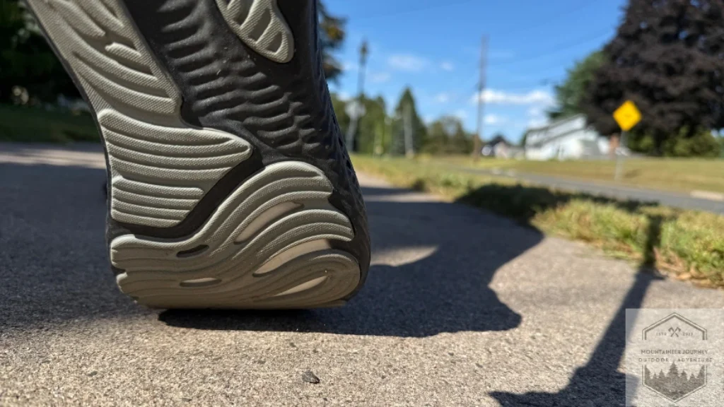 view of outsole during gait cycle on concrete