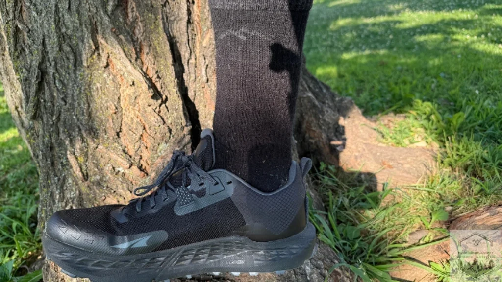 Standing on tree root with Timp 5