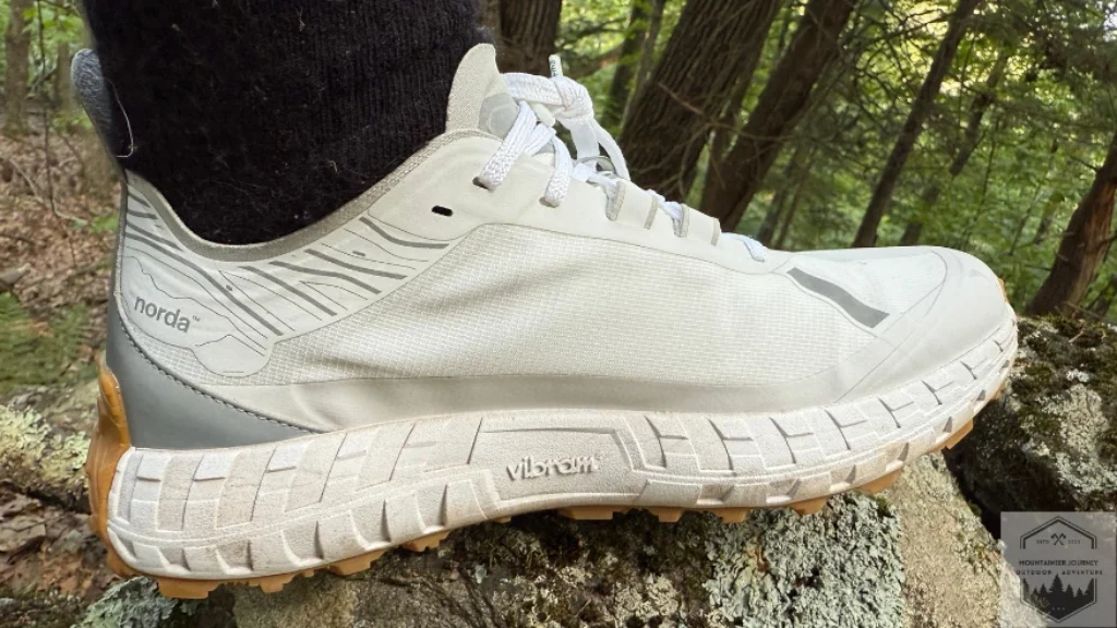 standing on a rock with shoe