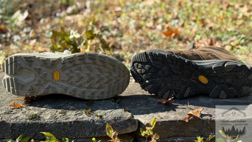 The Hoka Kaha 3 (Vibram Megagrip outsole) next to the Moab 3 (Vibram TC5+ Outsole)