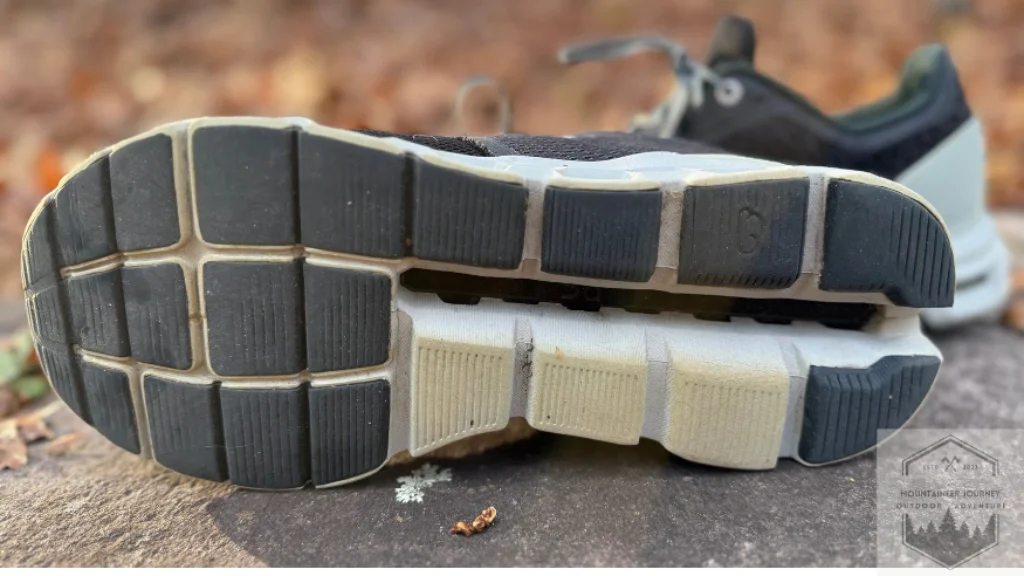 Long-term durability test of the On Cloud 6 outsole after 6 months of use, showing the lateral wear patterns on the CloudTec pods and rubber compound.