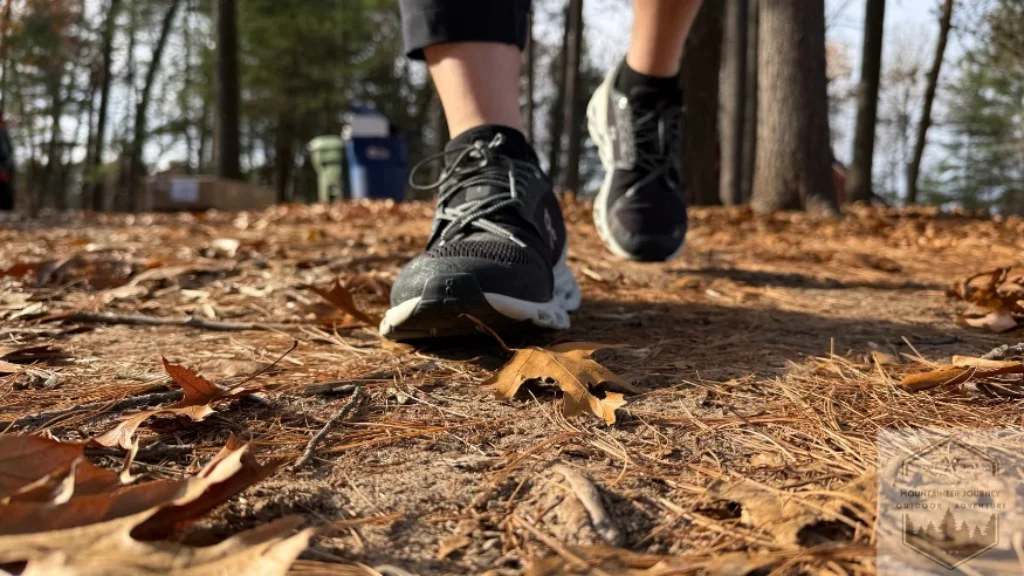 Testing the On Cloud 6 traction on a leaf-covered sidewalk to evaluate the grip of the CloudTec rubber pods on slick, organic surfaces.