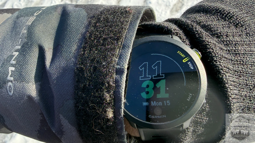 Forerunner 55 watch face during testing on a hike