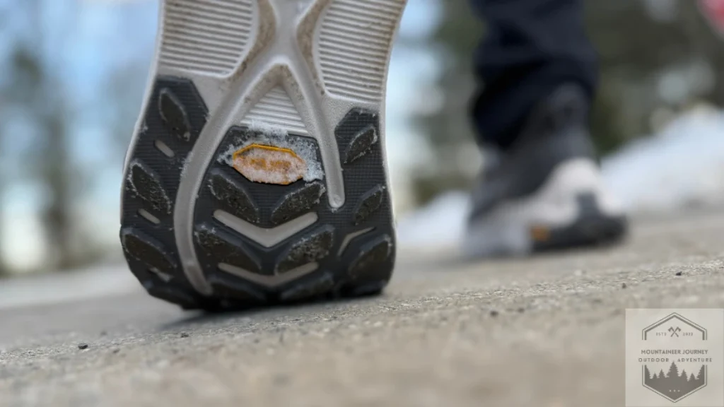 View of Vibram outsole on Transport 2 with ice filled between lugs