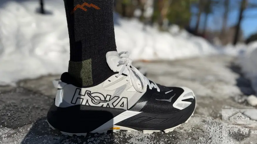 Speedgoat 7 on concrete with surrounding snow